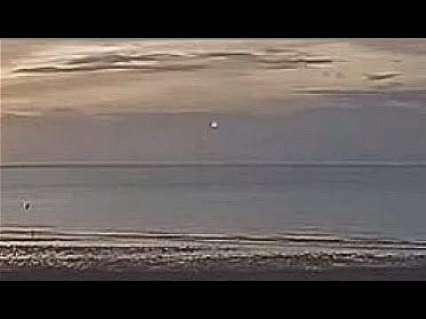 UFO Caught On Live Web Cam Ascending Out Of View Over St Ives Bay In Cornwall, England.