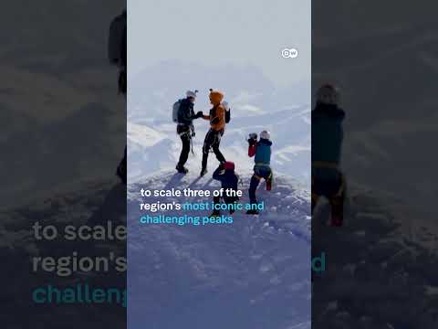 Mountaineers break Alpine climbing speed record | DW News